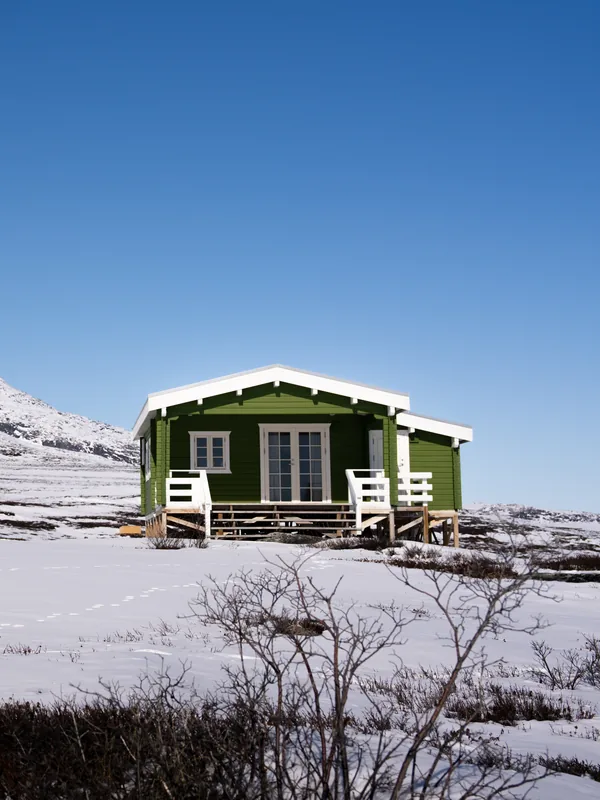 Remote cabin in a Greenlandic landscape